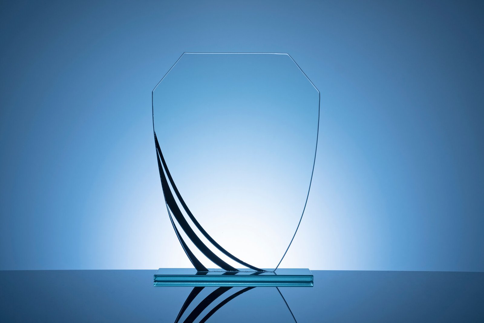 Elegant Blank Glass Shield Trophy On Dark Blue 2026 01 07 02 23 10 Utc